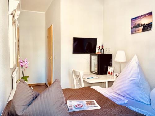 Einzelzimmer mit Boxspringbett